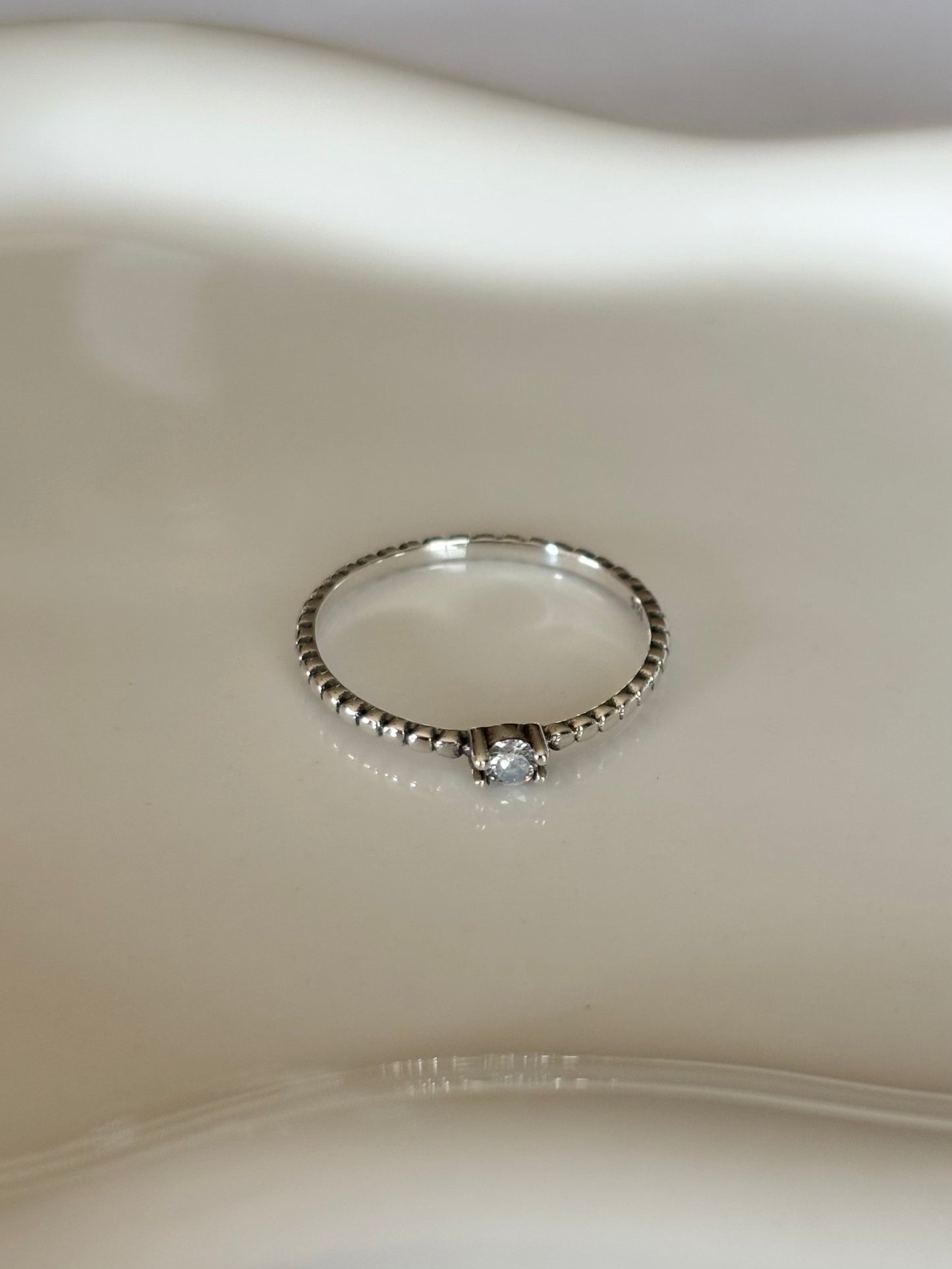 Tiny Round CZ Solitaire Sterling Silver Ring